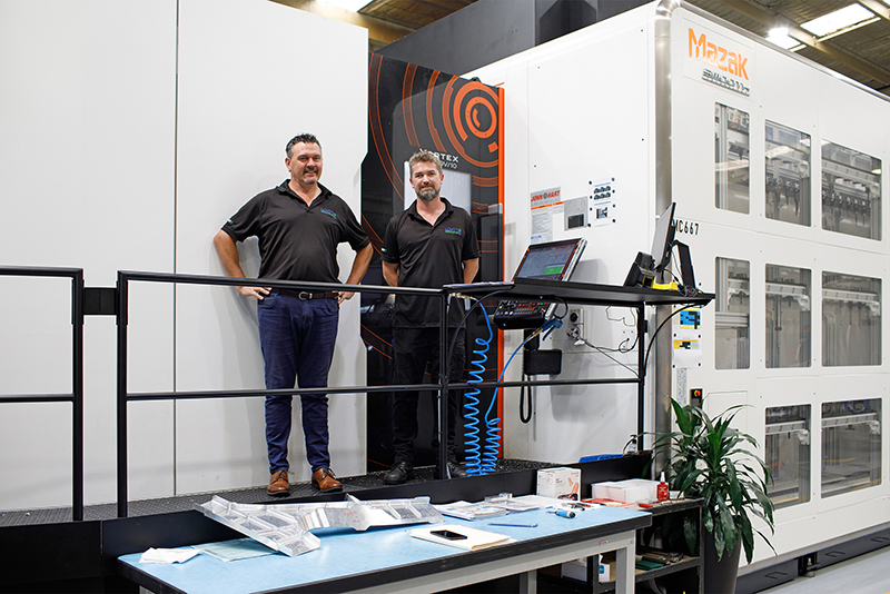 Lovitts Manufacturing Director Bruce Ramsay left with Team Leader LukeMeggs showing off the companys new Mazak Vortex e 1600V 10